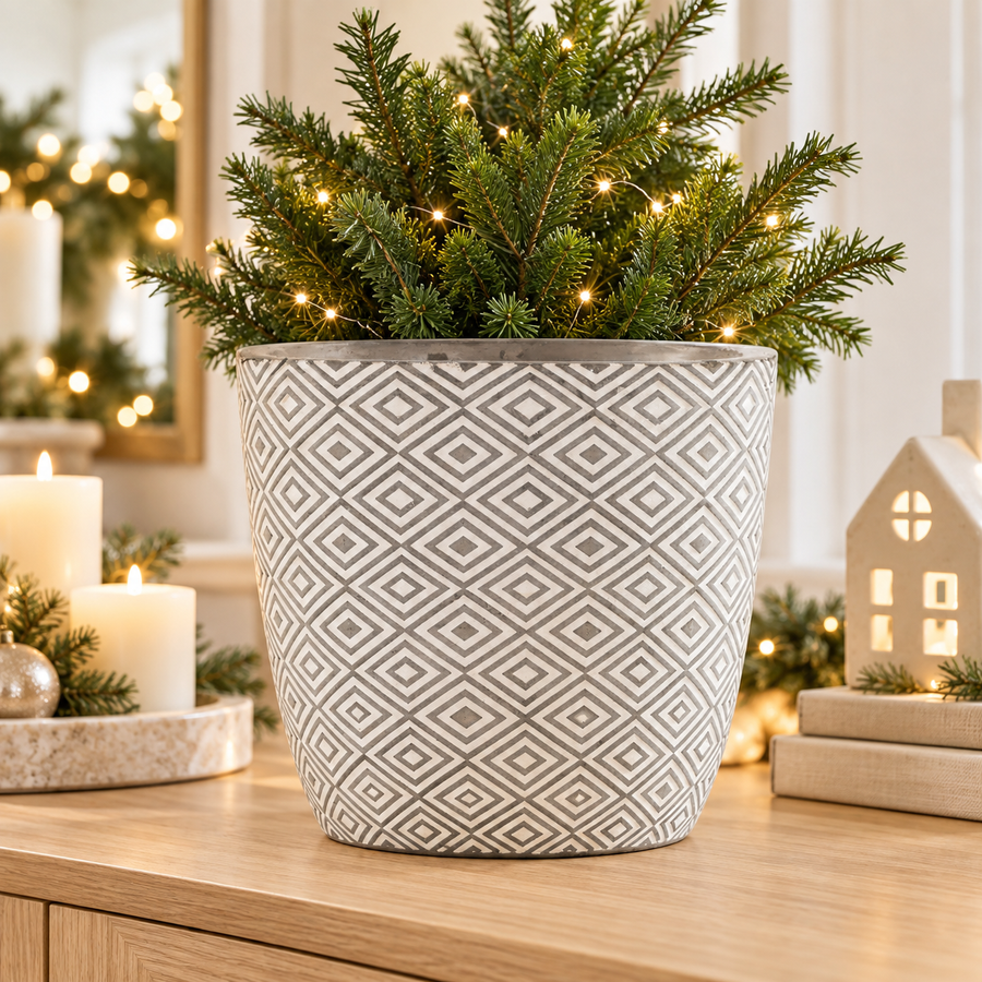 Grey and white Aztec planter in a warm festive home setting