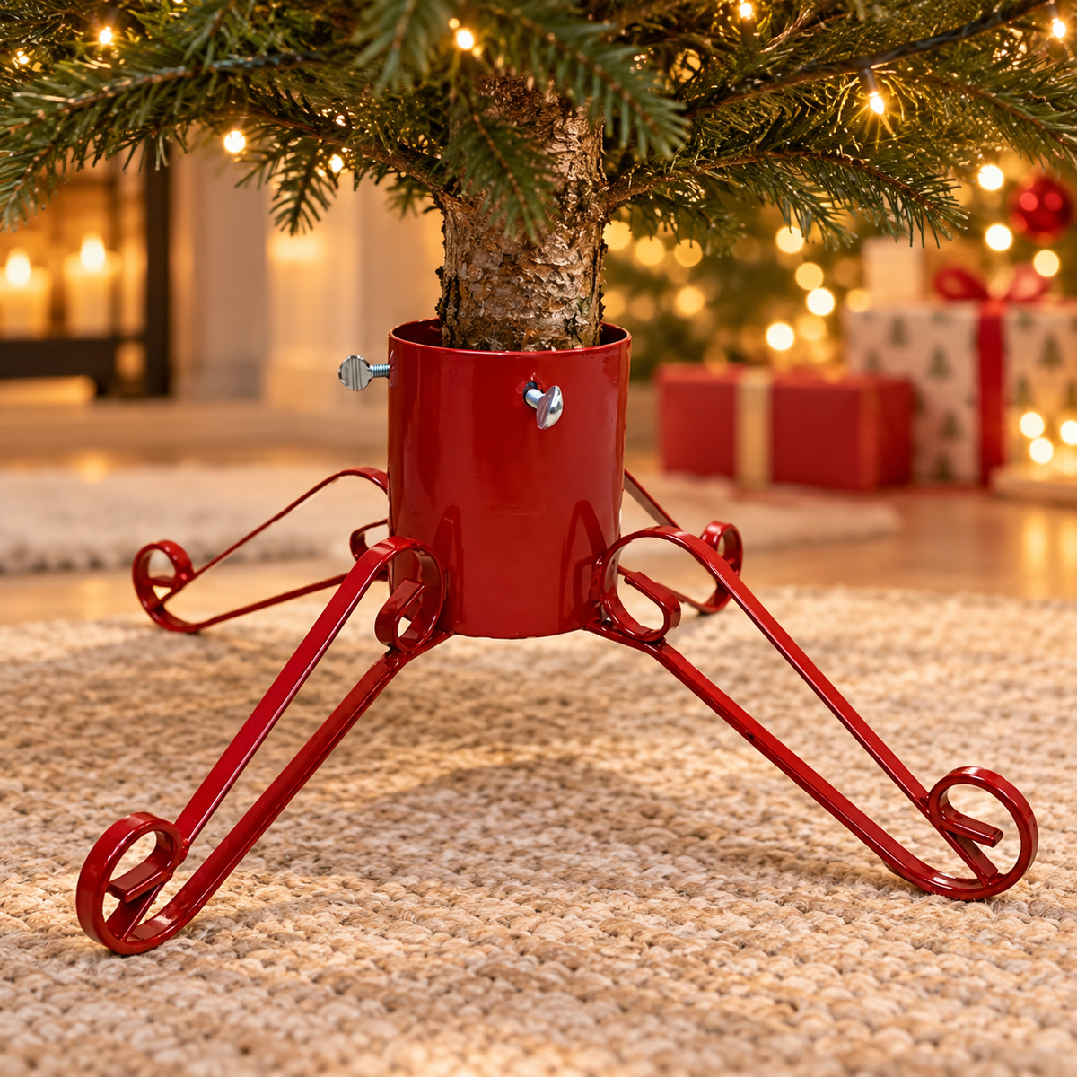 Red heavy-duty Christmas tree stand supporting a real tree