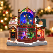 LED Christmas Toy Shop Scene Polyresin Indoor Decoration L.19cm W.30.5cm H.28.5cm – full product in a festive home setting