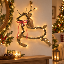 LED hanging willow Christmas reindeer glowing in a festive interior