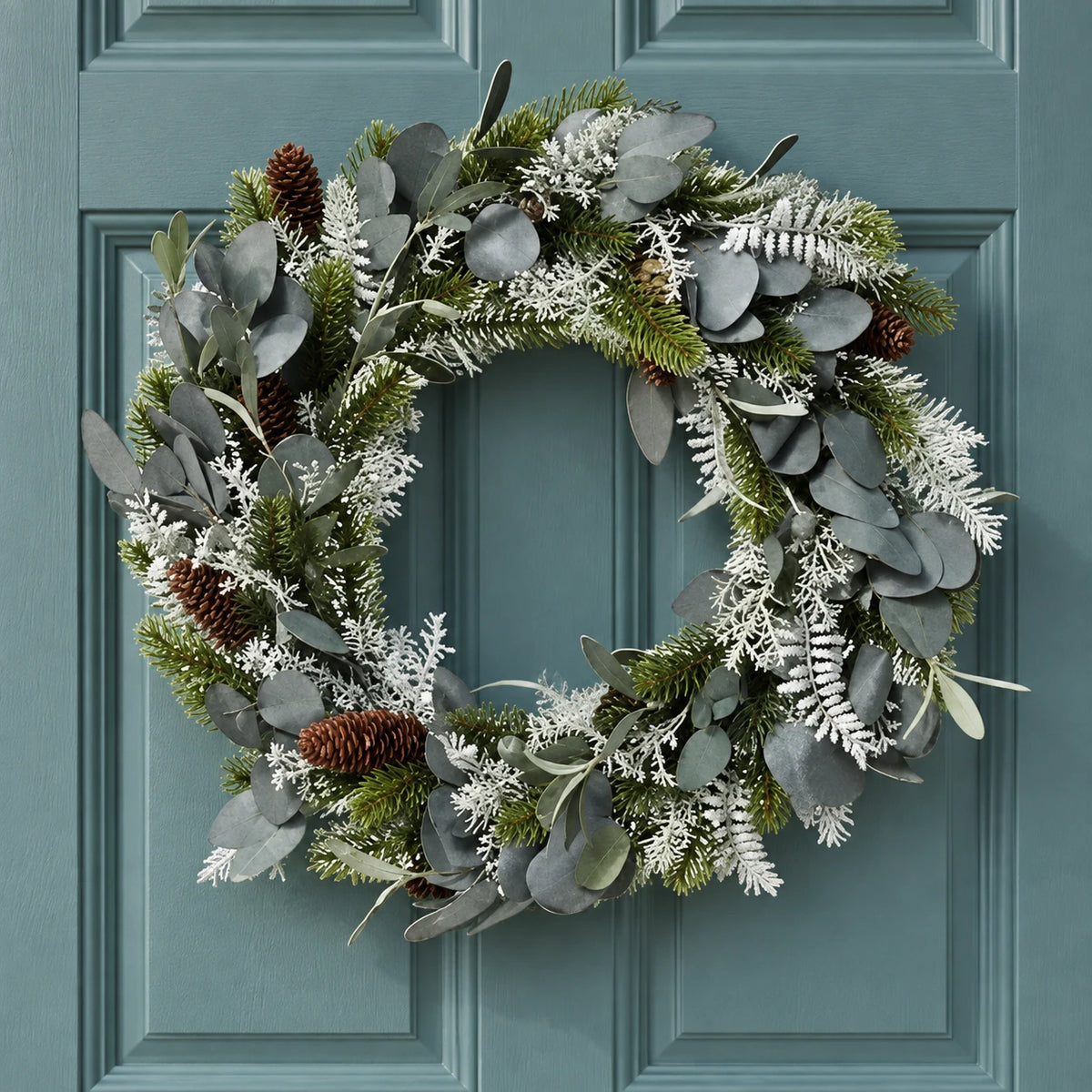 Silver Leaf & Pinecone Christmas Wreath – 40cm – full product in a festive home setting