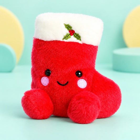 Palm Pals Christmas Holly Stocking 5in shown in full on a pale teal studio background