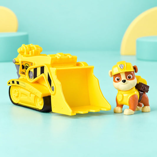 Paw Patrol Basic Vehicle - Rubble shown in full on a pale teal studio background