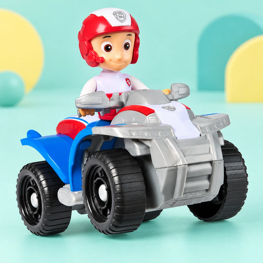 Paw Patrol Basic Vehicle - Ryder shown in full on a pale teal studio background