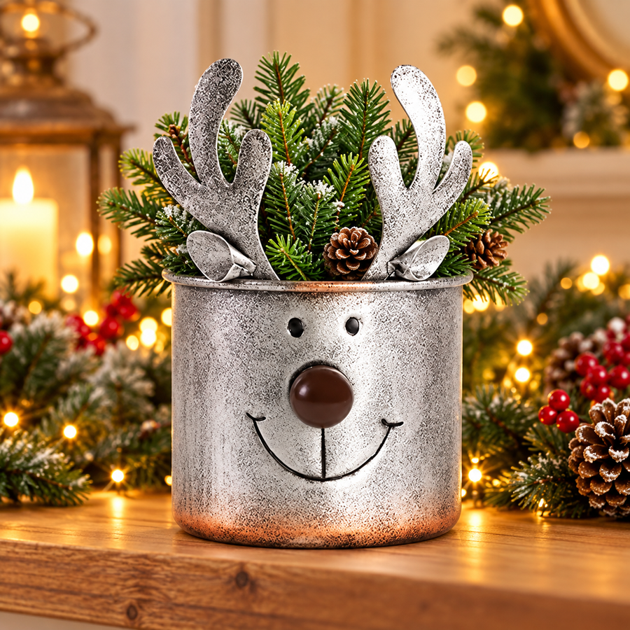 Antiqued silver reindeer metal planter with festive greenery