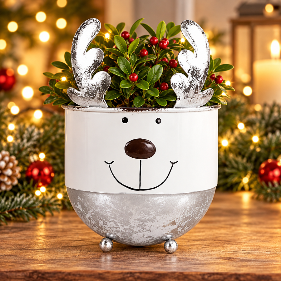 Silver and white reindeer planter with feet in a festive display