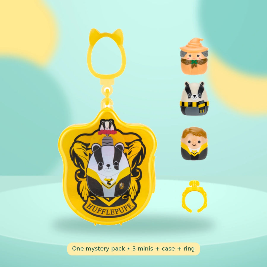 Squishalongs - Harry Potter Clip-a-longs on a playful mint studio display — One mystery pack • 3 minis + case + ring