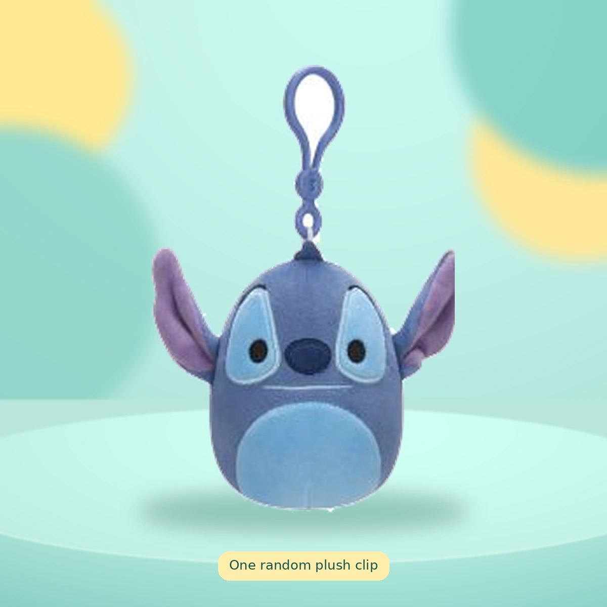 Squishmallows - 3.5in Disney Clips Asst on a playful mint studio display — One random plush clip