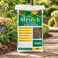 Single Strulch 100L / 9kg straw mulch bag beside a planted garden border