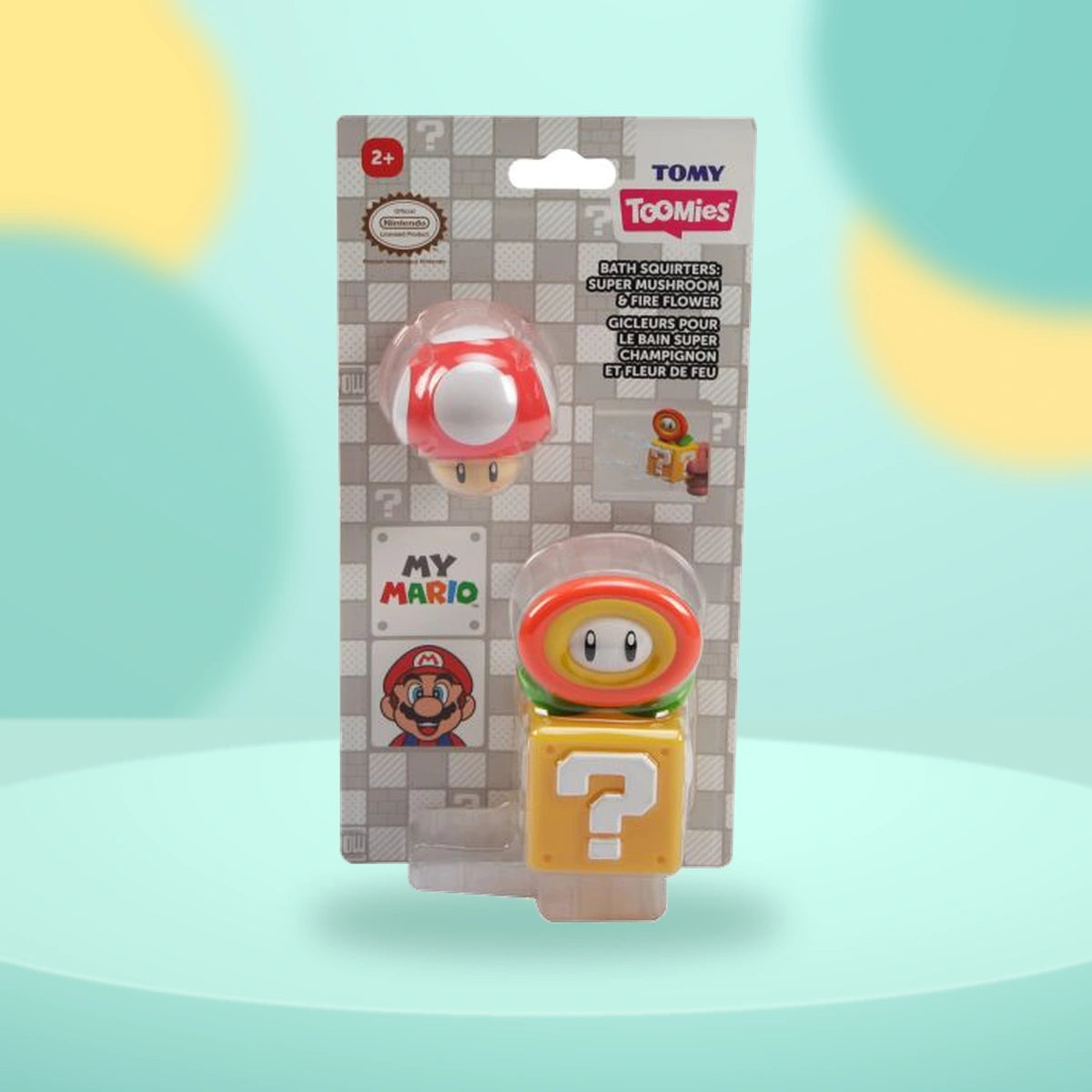 Toomies Super Mario Squirters Mushroom & Fire Flower on a playful mint studio display
