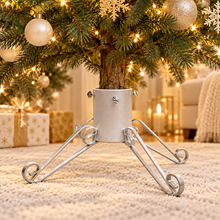 White sparkle traditional 5-inch Christmas tree stand supporting a real tree